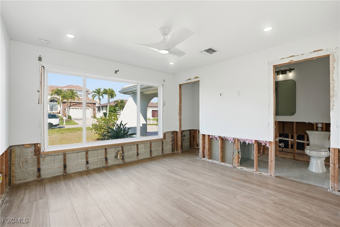 380 Conners Avenue Naples, FL 34108 - Photo 23 of 49 a view of workspace with furniture and window