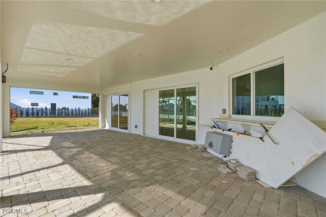 380 Conners Avenue Naples, FL 34108 - Photo 33 of 49 a spacious bathroom with a tub and window