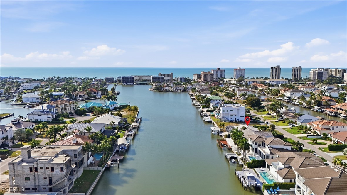 380 Conners Avenue Naples, FL 34108 - Photo 4 of 49 an aerial view of a city