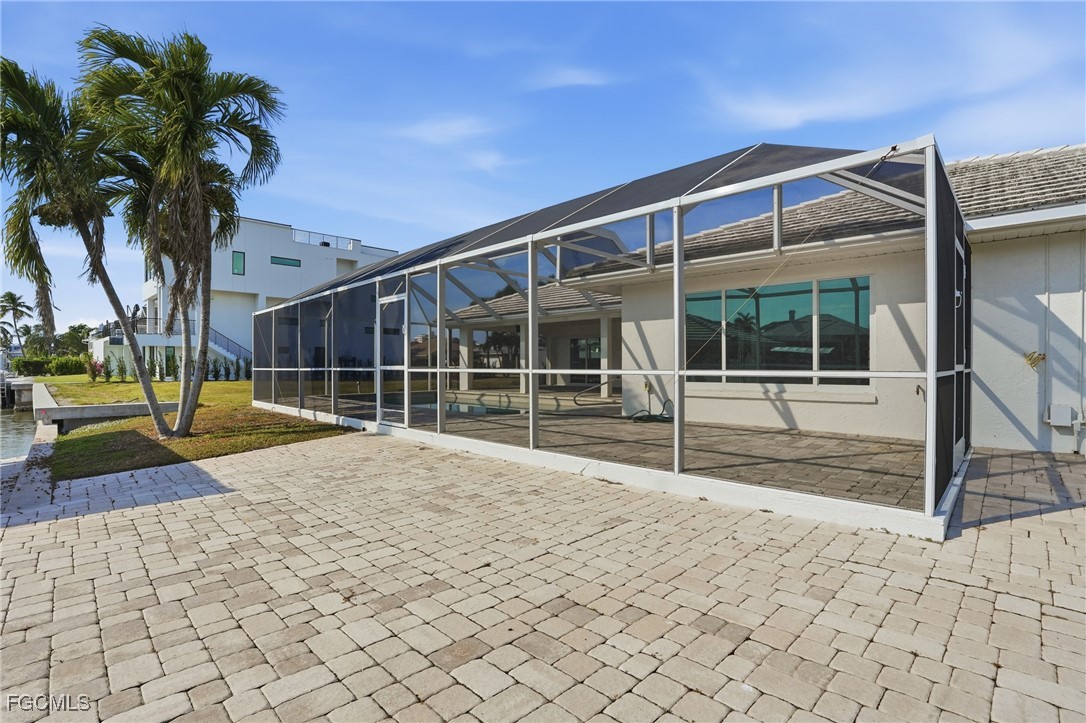 380 Conners Avenue Naples, FL 34108 - Photo 41 of 49 a view of a backyard