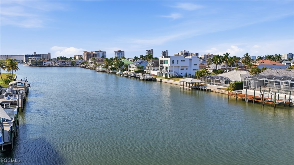 380 Conners Avenue Naples, FL 34108 - Photo 45 of 49 a view of a city with tall buildings