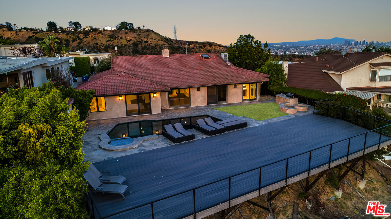 2169 Hercules Drive Los Angeles, CA 90046 - Photo 23 of 29 a view of a house with a yard