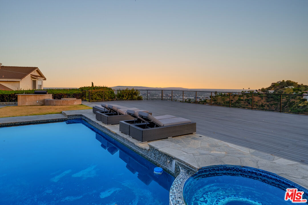 2169 Hercules Drive Los Angeles, CA 90046 - Photo 28 of 29 a living room with furniture and a table