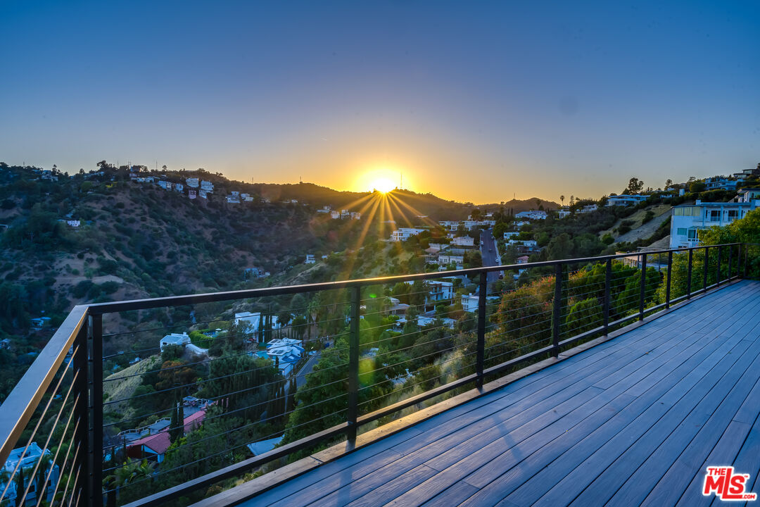 2169 Hercules Drive Los Angeles, CA 90046 - Photo 3 of 29 a view of a balcony with a forest