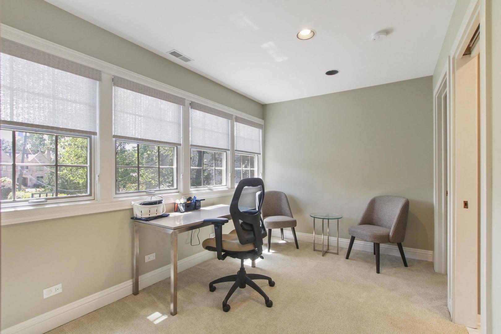 720 Becker Road Glenview, IL 60025 - Photo 15 of 44 a view of a workspace with furniture and a window
