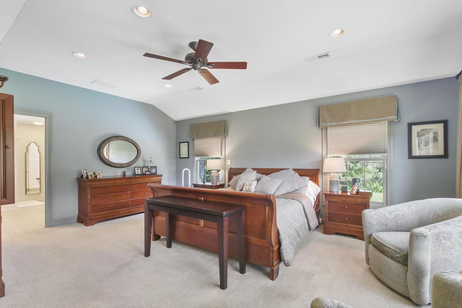 720 Becker Road Glenview, IL 60025 - Photo 19 of 44 a bed room with a bed and a window