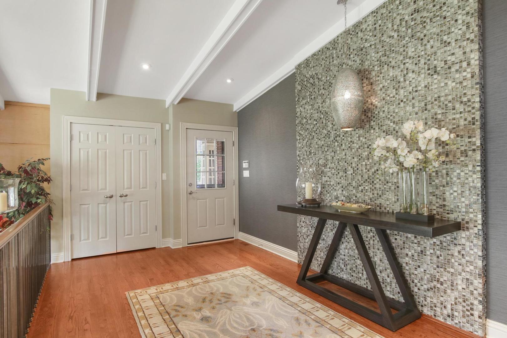 720 Becker Road Glenview, IL 60025 - Photo 3 of 44 wooden floor in an empty room with a window