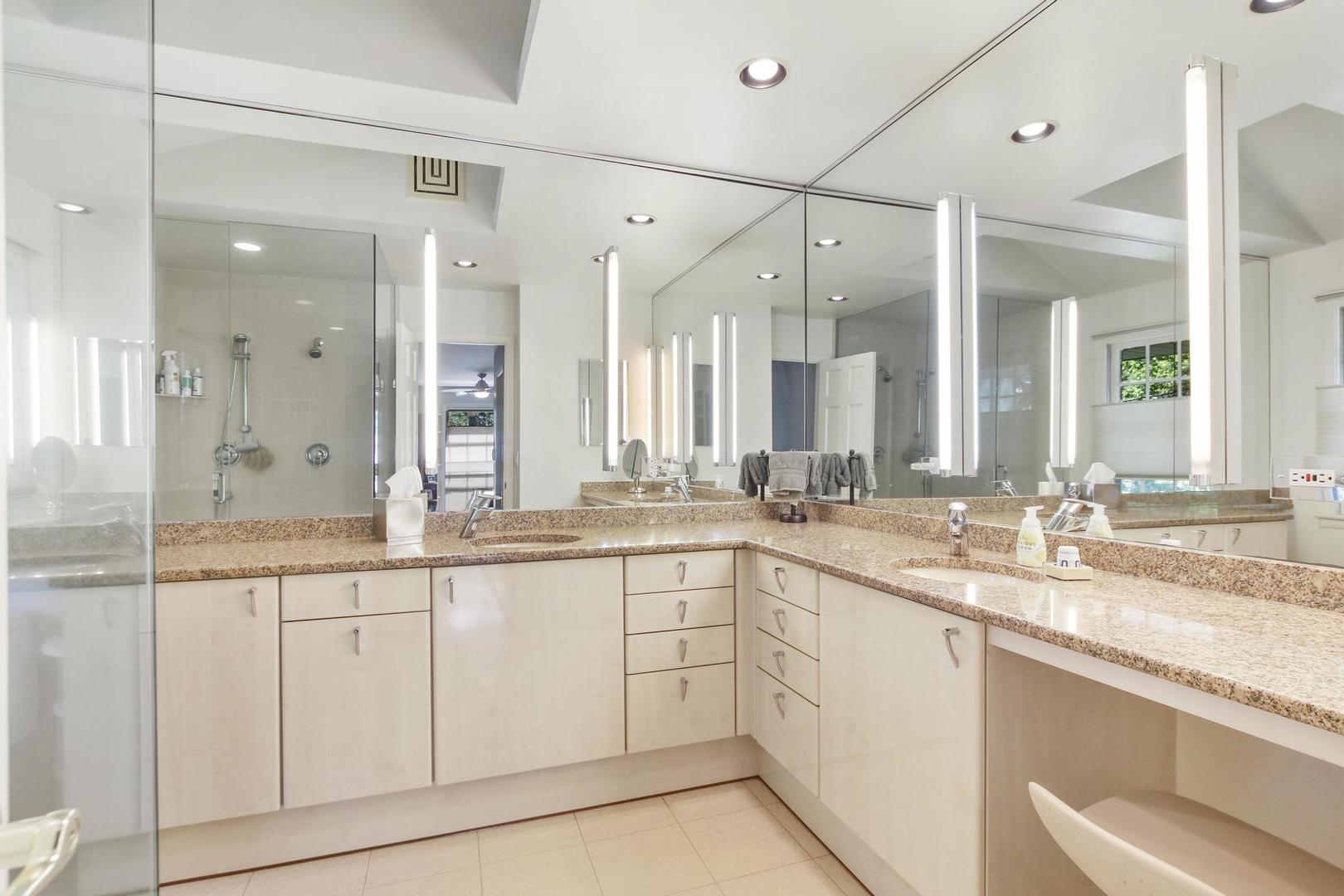 720 Becker Road Glenview, IL 60025 - Photo 32 of 44 a large white bathroom with a granite countertop sink mirror and a