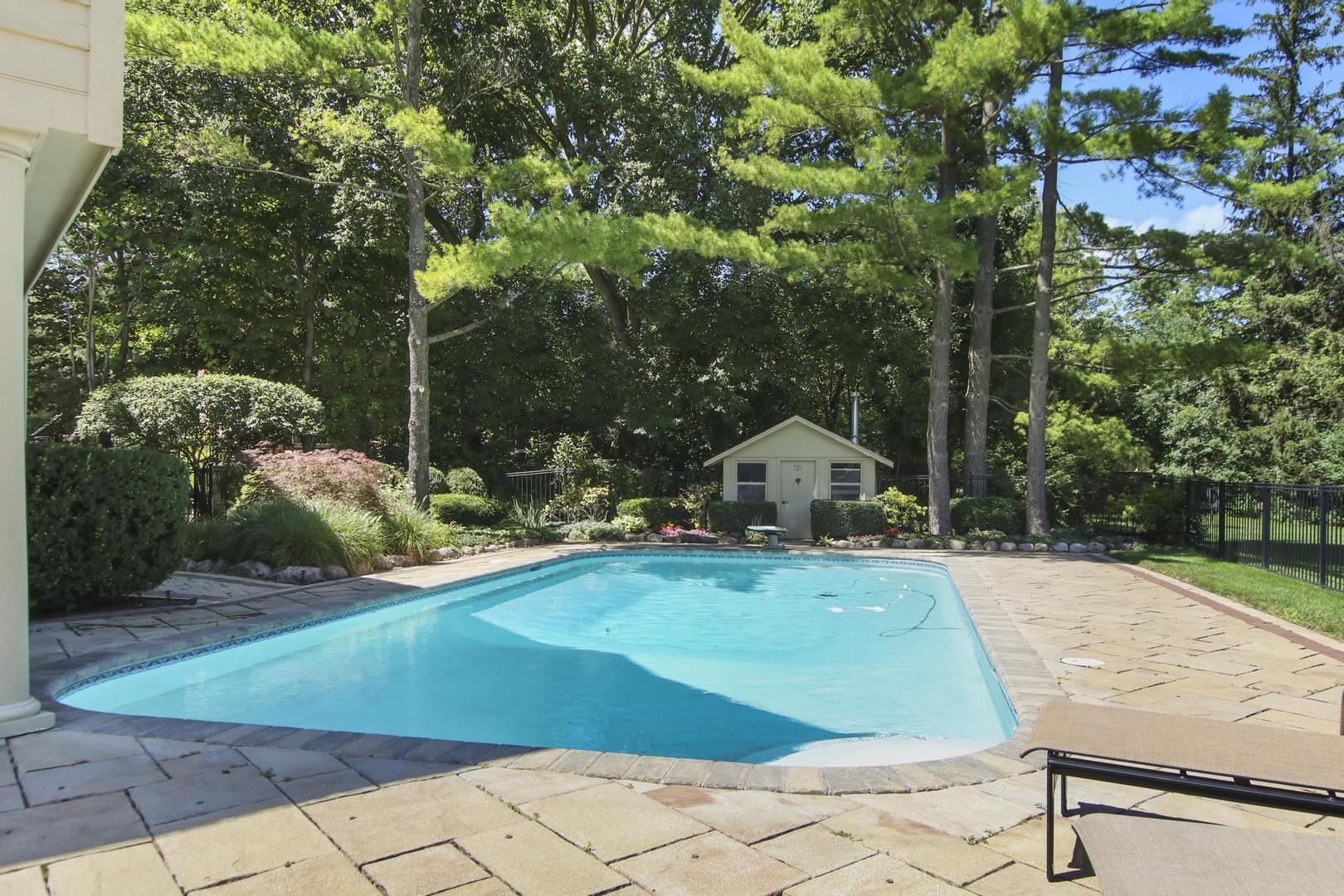 720 Becker Road Glenview, IL 60025 - Photo 36 of 44 a view of a house with backyard porch and sitting area