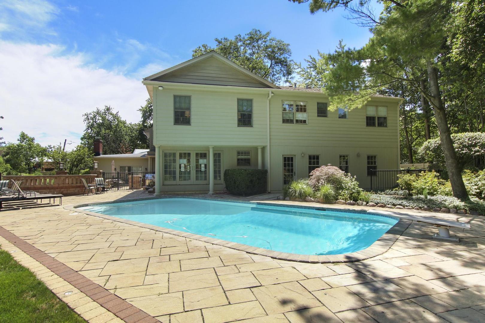 720 Becker Road Glenview, IL 60025 - Photo 37 of 44 a view of a house with backyard porch and sitting area