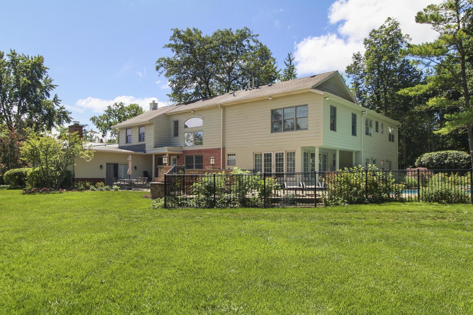 720 Becker Road Glenview, IL 60025 - Photo 39 of 44 a view of a house with a yard and sitting area