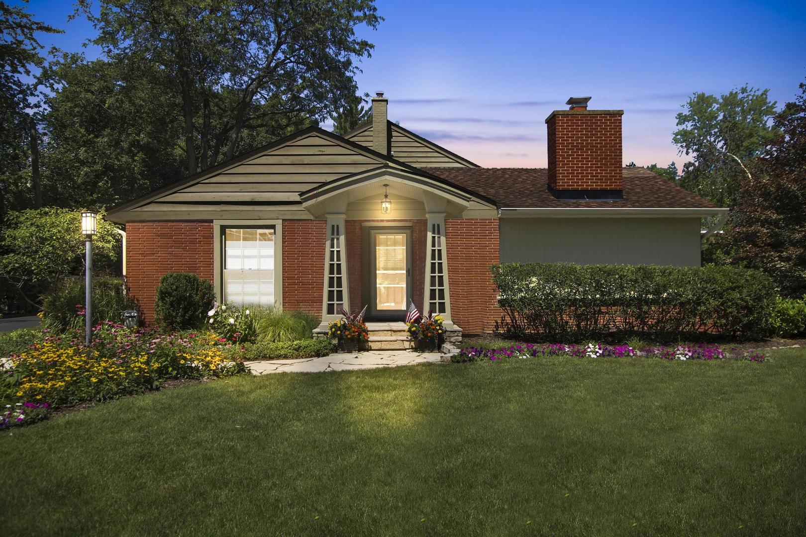 720 Becker Road Glenview, IL 60025 - Photo 40 of 44 a front view of a house with a yard