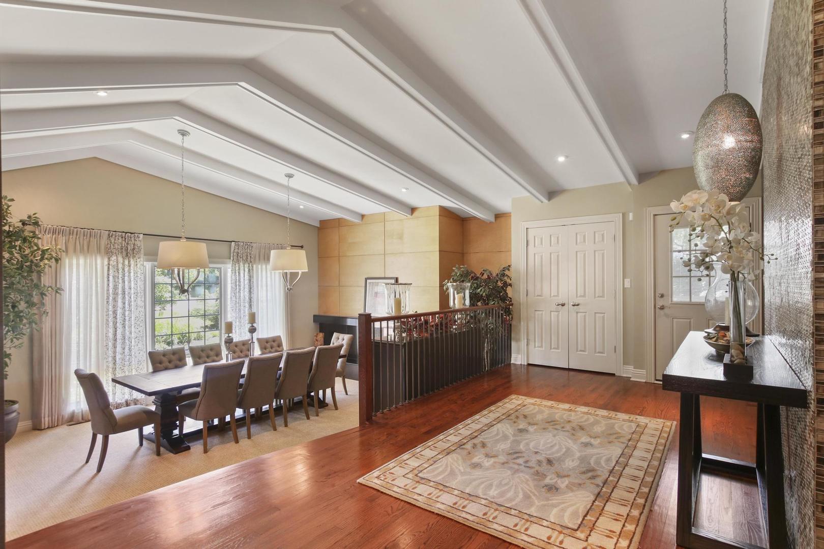720 Becker Road Glenview, IL 60025 - Photo 4 of 44 a living room with furniture and wooden floor