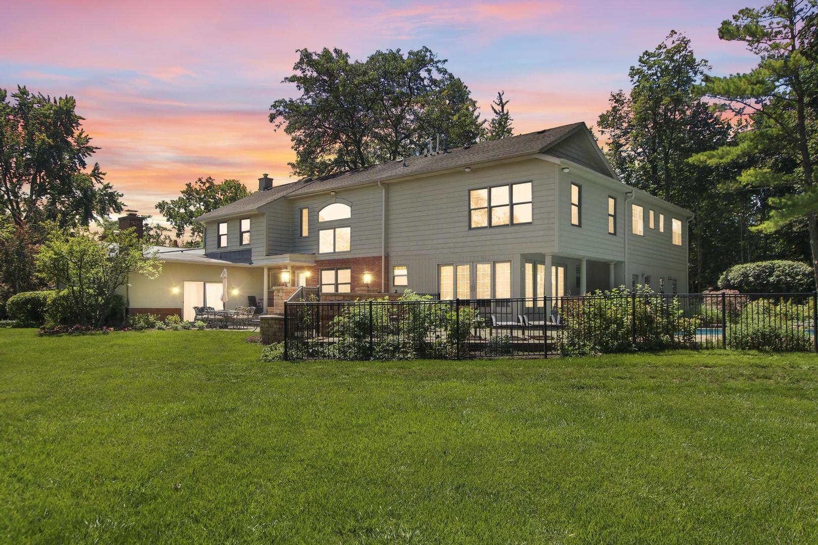 720 Becker Road Glenview, IL 60025 - Photo 41 of 44 a front view of a house with a yard