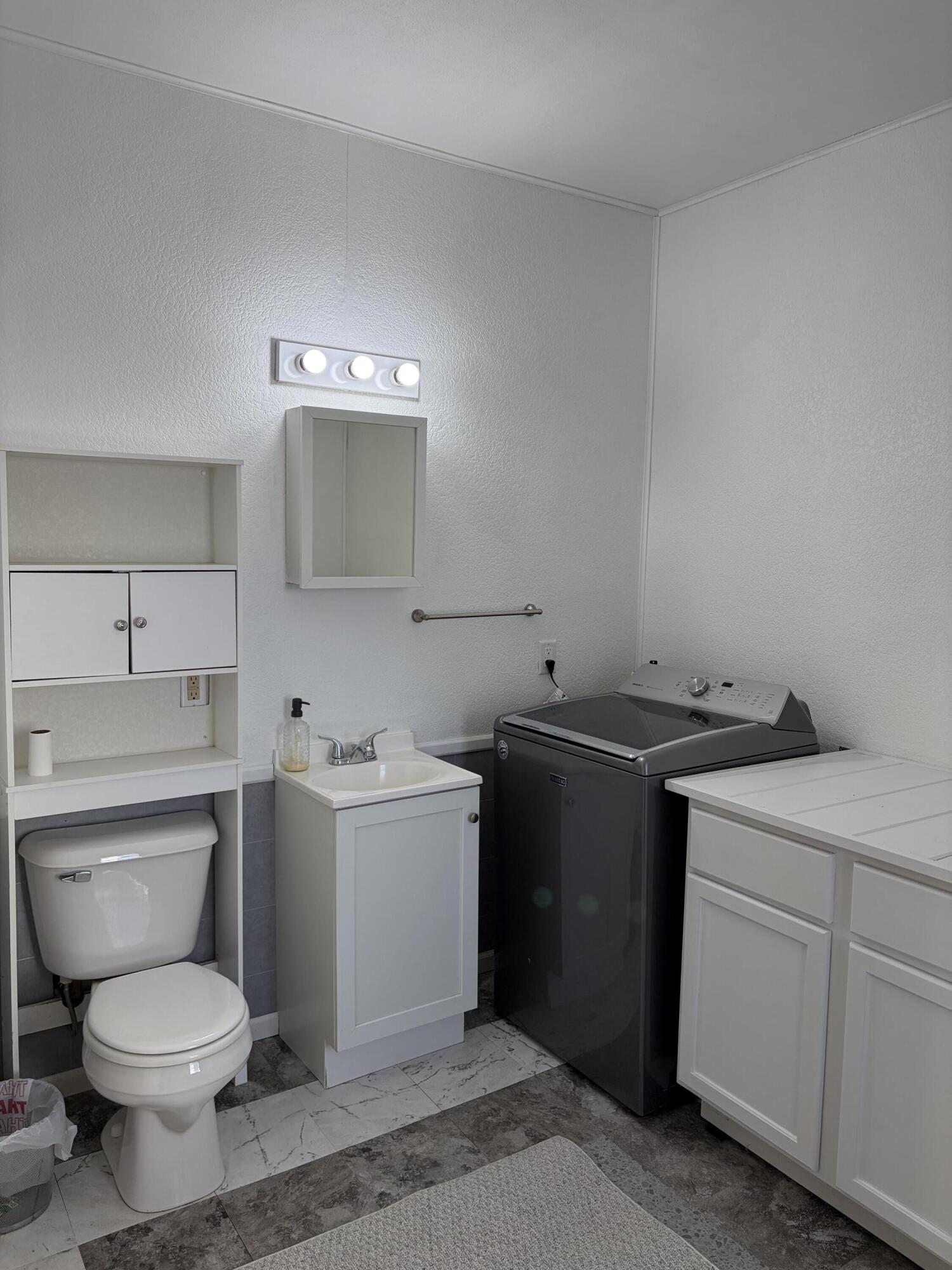 825 Smith Street Stevens Point, WI 54481 - Photo 22 of 32 Laundry / Half Bath