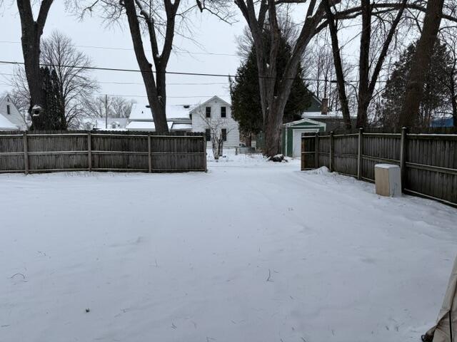 825 Smith Street Stevens Point, WI 54481 - Photo 29 of 32 Backyard towards additional parking