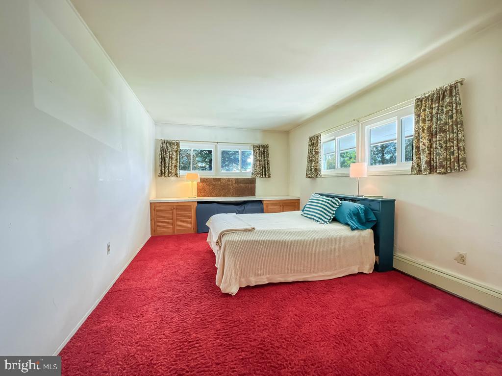 37 Full Turn Road Levittown, PA 19056 - Photo 13 of 38 a spacious bedroom with a bed and a couch