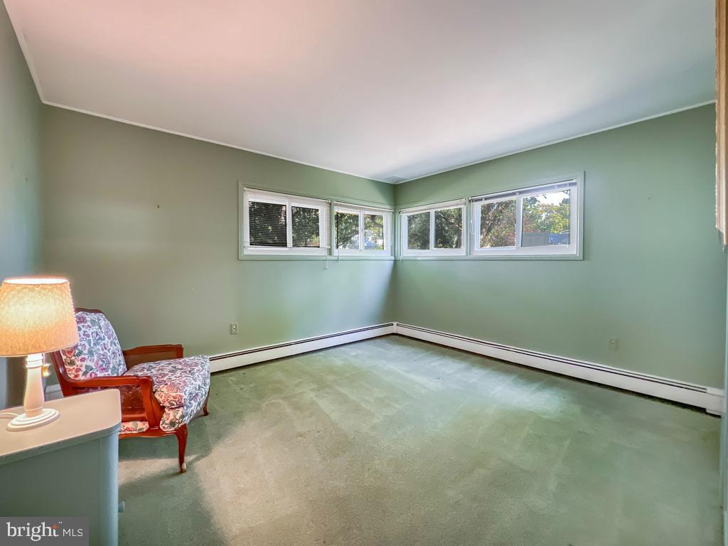 37 Full Turn Road Levittown, PA 19056 - Photo 16 of 38 a living room with furniture and a window