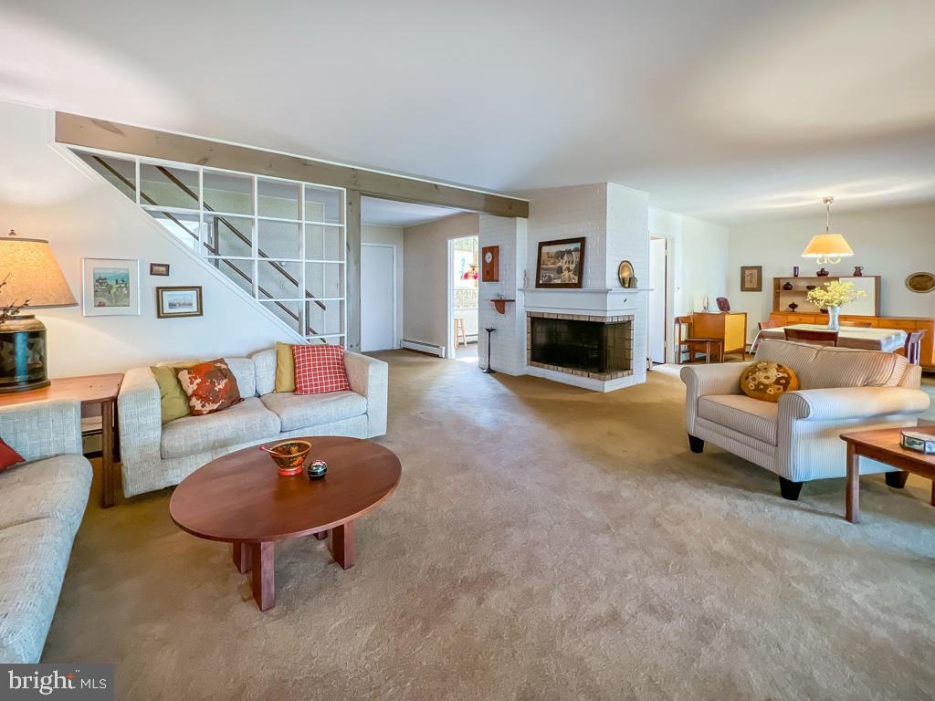 37 Full Turn Road Levittown, PA 19056 - Photo 2 of 38 a living room with furniture and a fireplace
