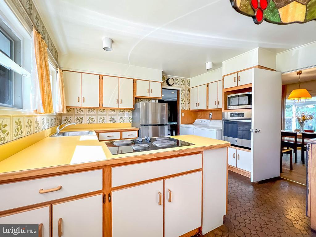 37 Full Turn Road Levittown, PA 19056 - Photo 6 of 38 a kitchen that has a lot of cabinets in it and wooden floor