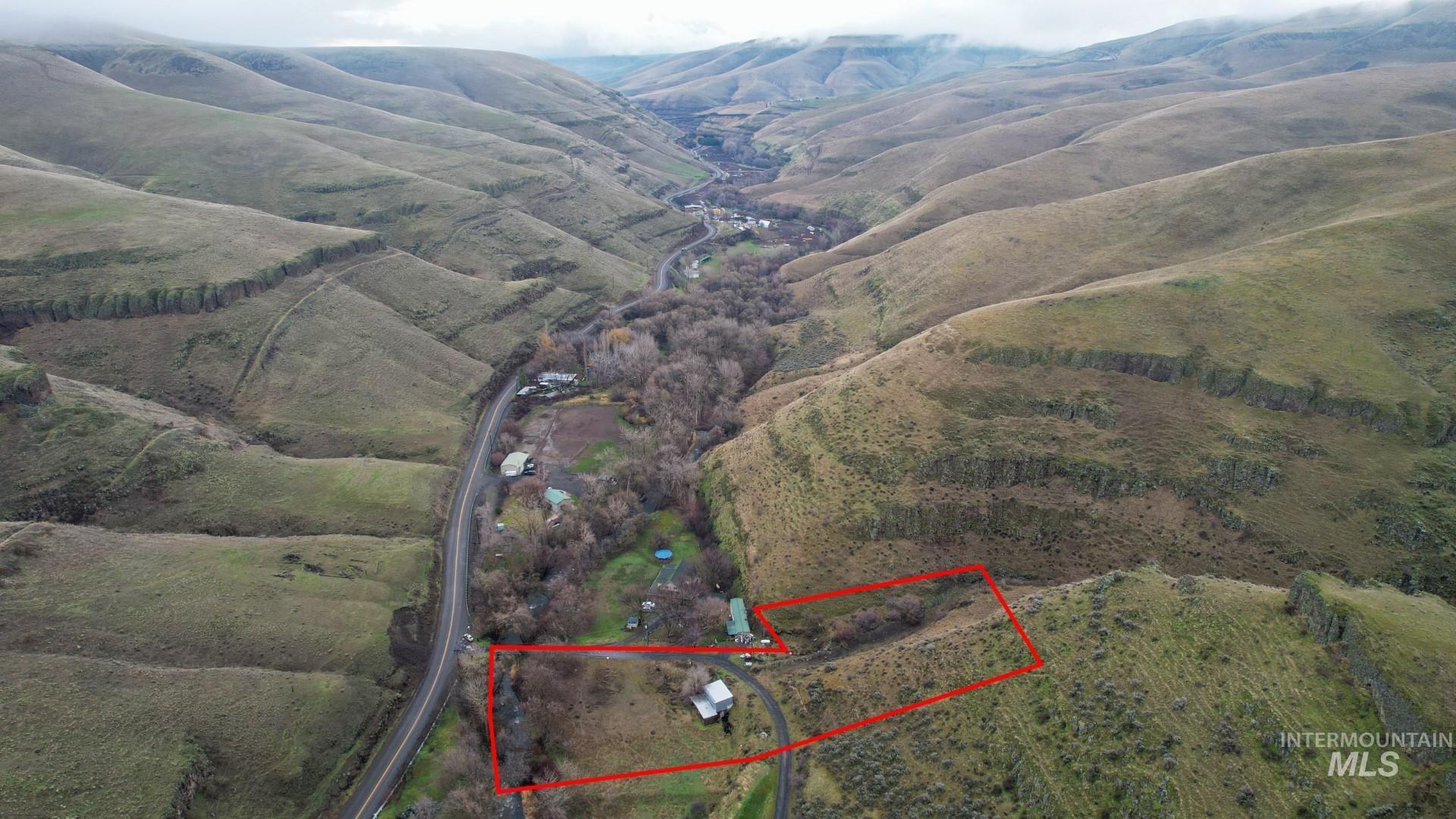8047 Asotin Creek Road Asotin, WA 99402 - Photo 5 of 36 View of rural area with property parcel outlined and a mountain backdrop