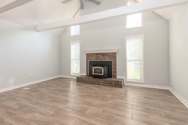 a view of kitchen with wooden floor