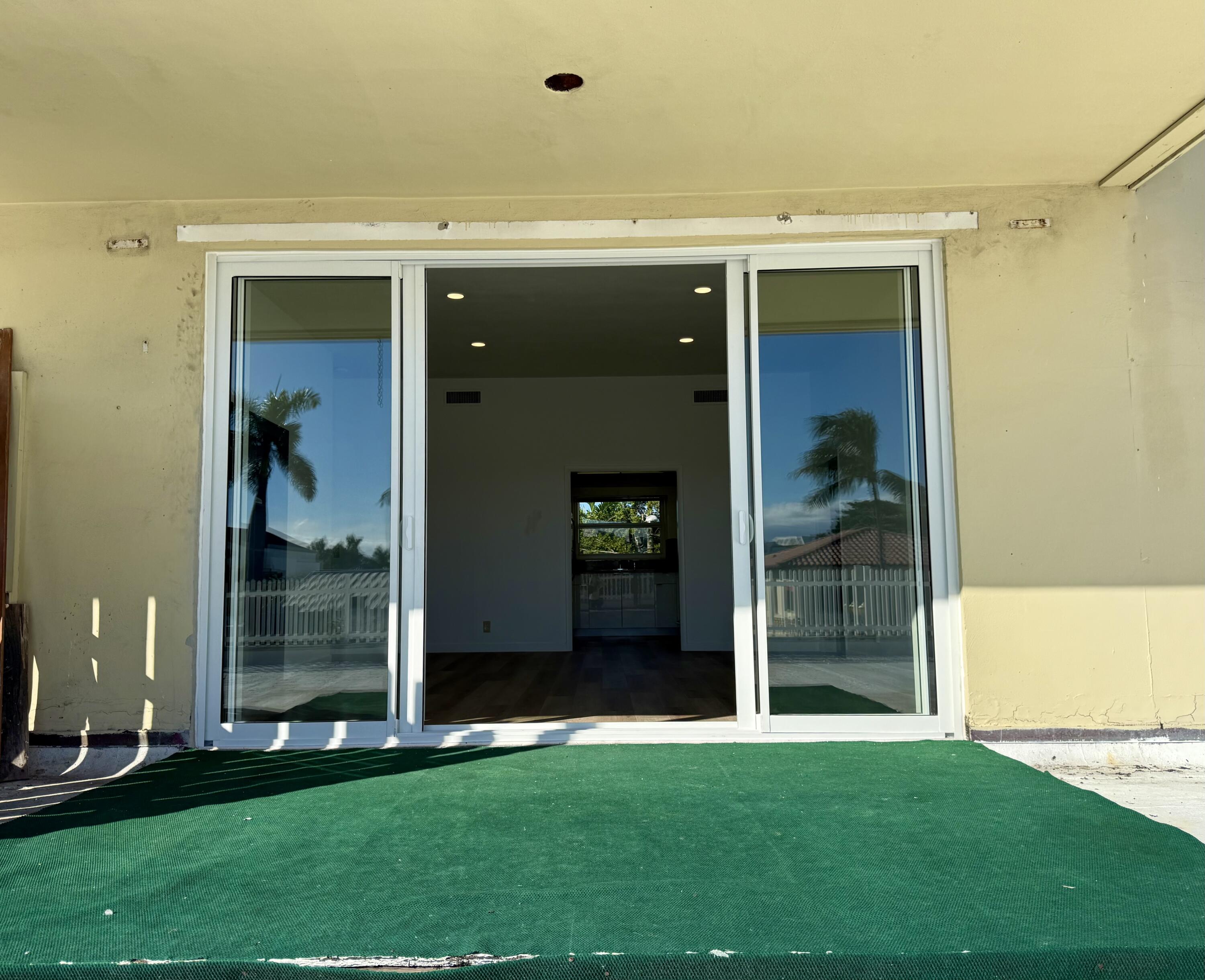 1165 East Atlantic Avenue, Unit A Delray Beach, FL 33483 - Photo 20 of 30 a view of outdoor space and yard
