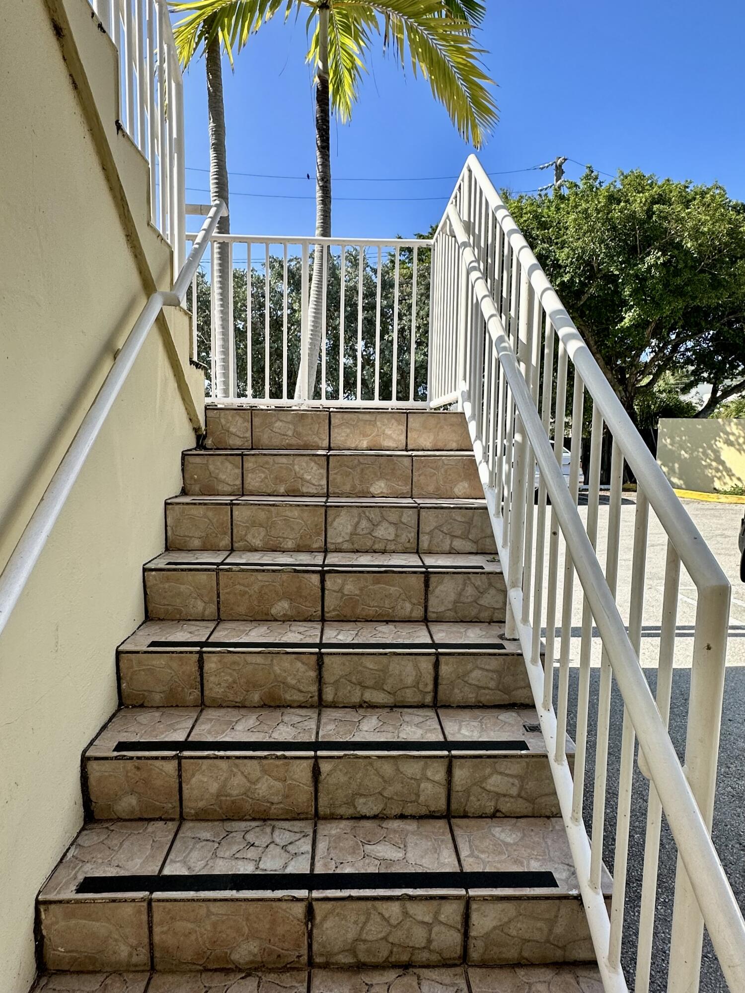 1165 East Atlantic Avenue, Unit A Delray Beach, FL 33483 - Photo 26 of 30 a view of entryway with stairs