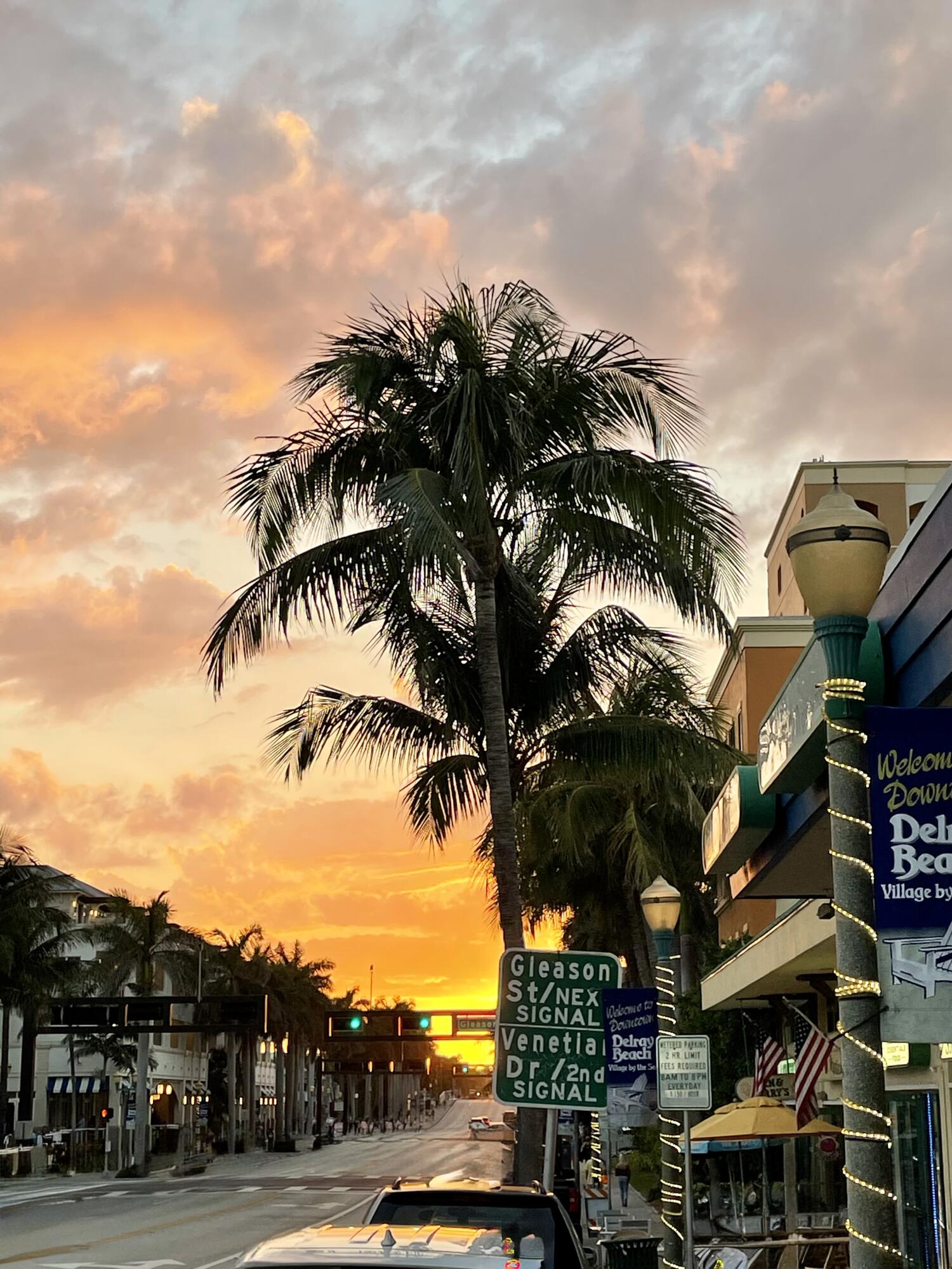 1165 East Atlantic Avenue, Unit A Delray Beach, FL 33483 - Photo 29 of 30 a view of multiple houses with a yard and car parked