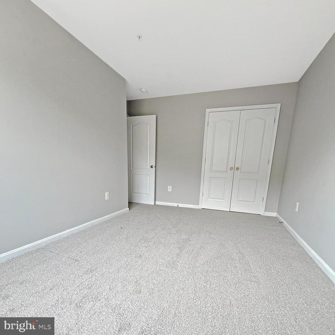 2718 Zeek Lane Lanham, MD 20706 - Photo 20 of 32 a view of an empty room and chandelier fan
