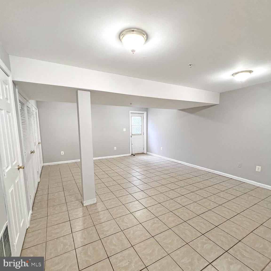 2718 Zeek Lane Lanham, MD 20706 - Photo 24 of 32 a view of an empty room and wooden floor