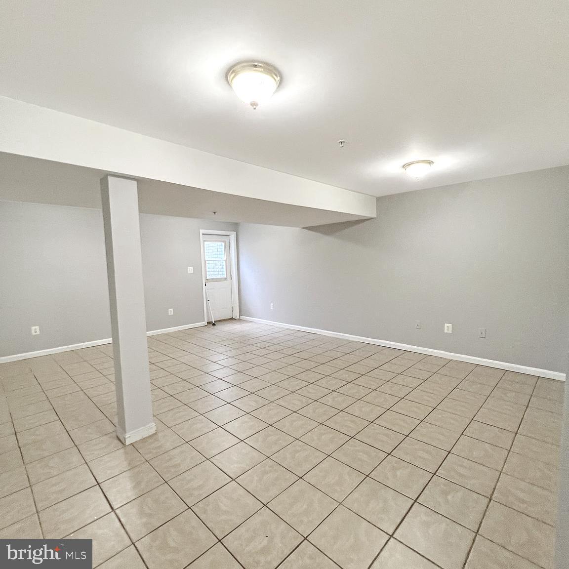 2718 Zeek Lane Lanham, MD 20706 - Photo 25 of 32 a view of an empty room and window