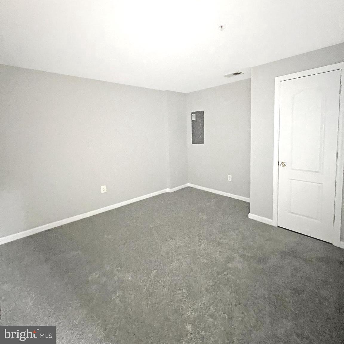 2718 Zeek Lane Lanham, MD 20706 - Photo 27 of 32 a view of an empty room with a window