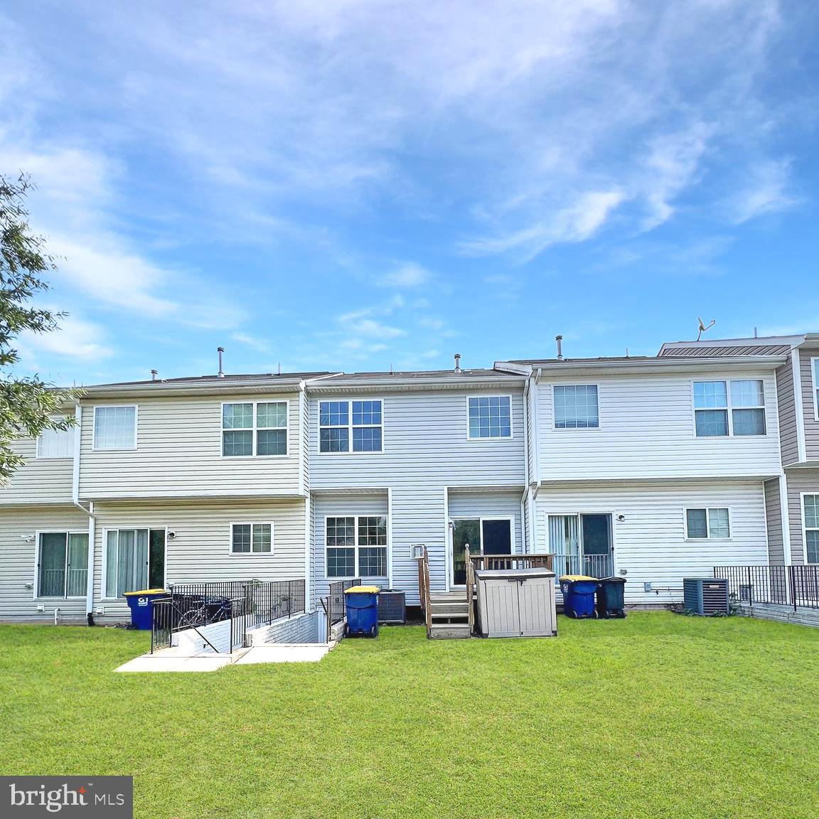 2718 Zeek Lane Lanham, MD 20706 - Photo 32 of 32 a view of a house with a yard and sitting area