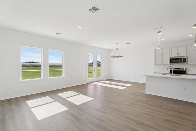 a bathroom with a sink a toilet and a bathtub