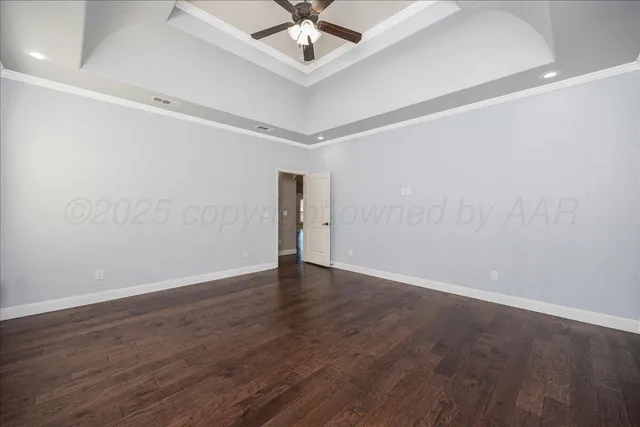 a spacious bathroom with a double vanity sink a mirror and a bathtub