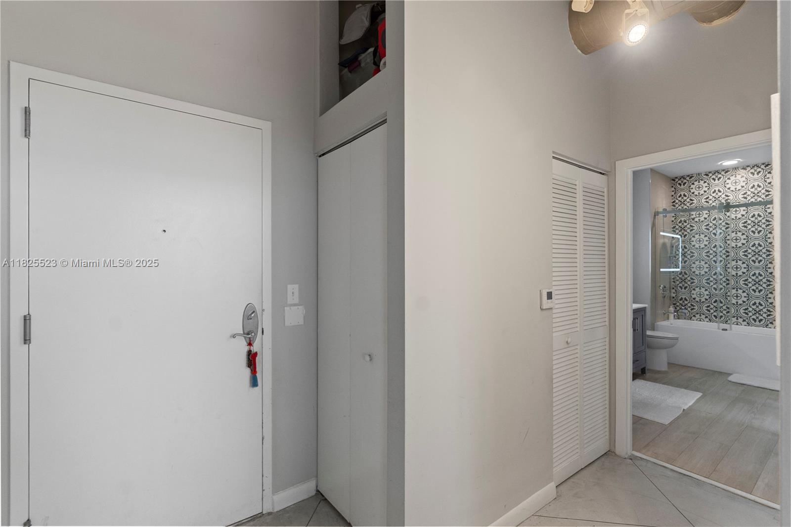 2001 Biscayne Boulevard, Unit 2201 Miami, FL 33137 - Photo 19 of 42 a bathroom with a shower