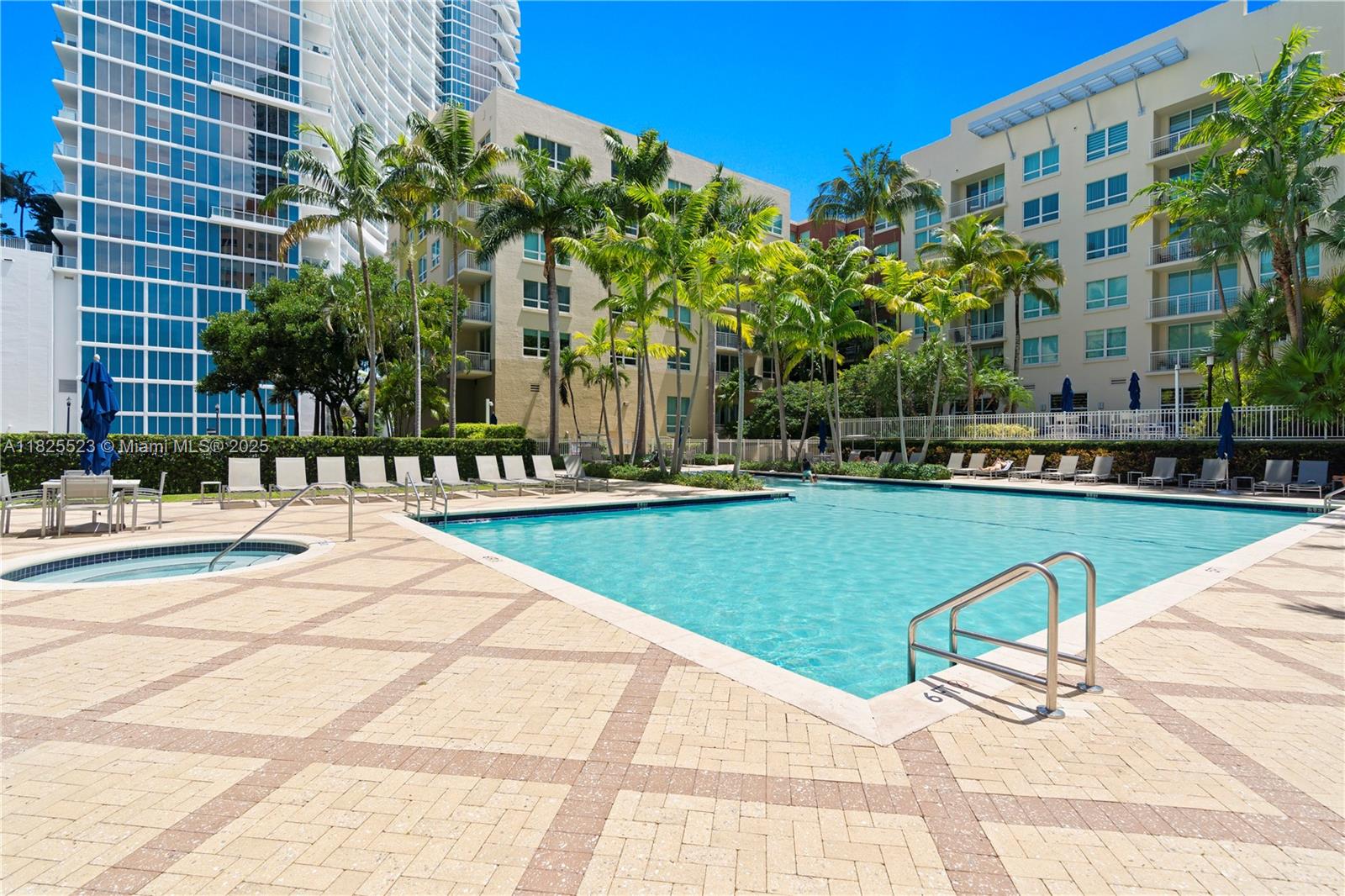 2001 Biscayne Boulevard, Unit 2201 Miami, FL 33137 - Photo 33 of 42 a building view with swimming pool and chairs