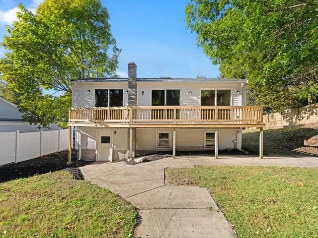 a house view with a backyard space