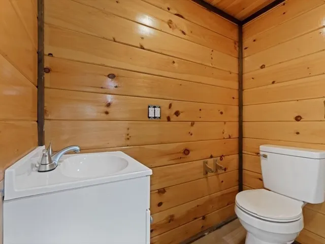 a bathroom with a toilet and sink