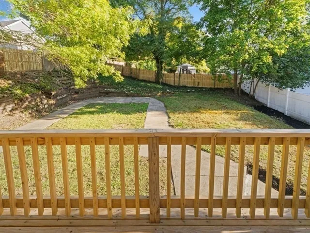 a view of a backyard with green space