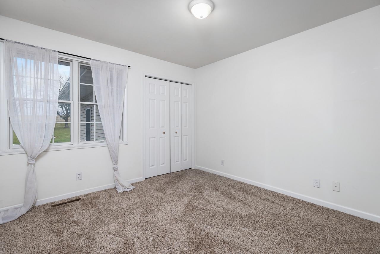1011 North Dakota Road Ridott, IL 61067 - Photo 13 of 34 an empty room with windows