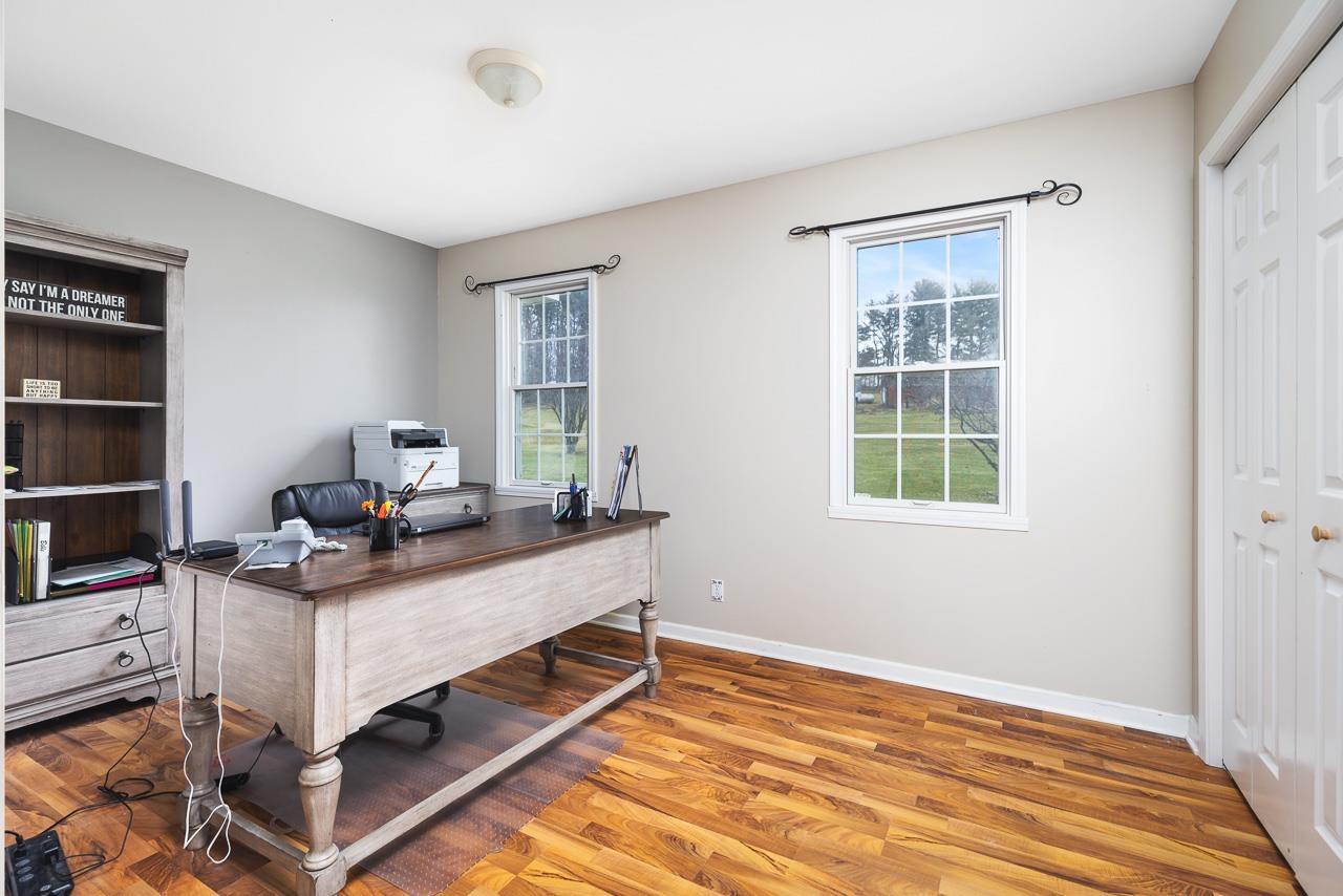 1011 North Dakota Road Ridott, IL 61067 - Photo 15 of 34 a view of a workspace with furniture and a window
