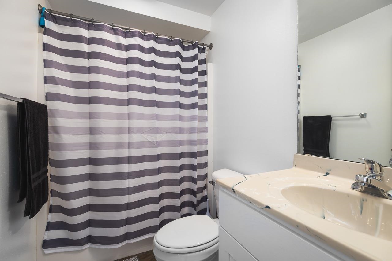 1011 North Dakota Road Ridott, IL 61067 - Photo 25 of 34 a bathroom with a sink toilet and shower
