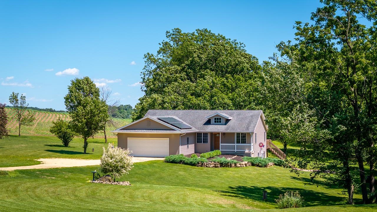 1011 North Dakota Road Ridott, IL 61067 - Photo 27 of 34 a front view of a house with a yard