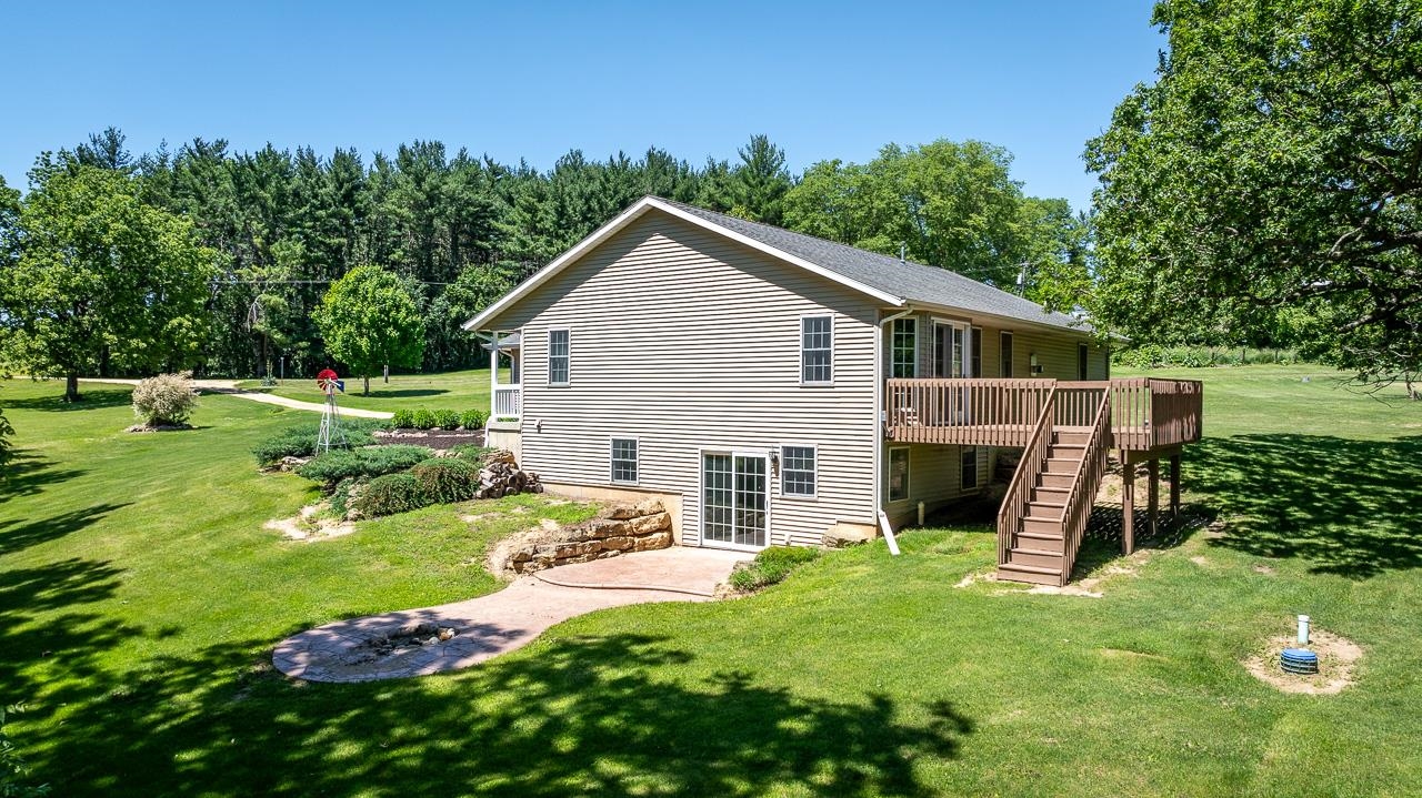 1011 North Dakota Road Ridott, IL 61067 - Photo 29 of 34 a view of backyard of house with outdoor seating and green space