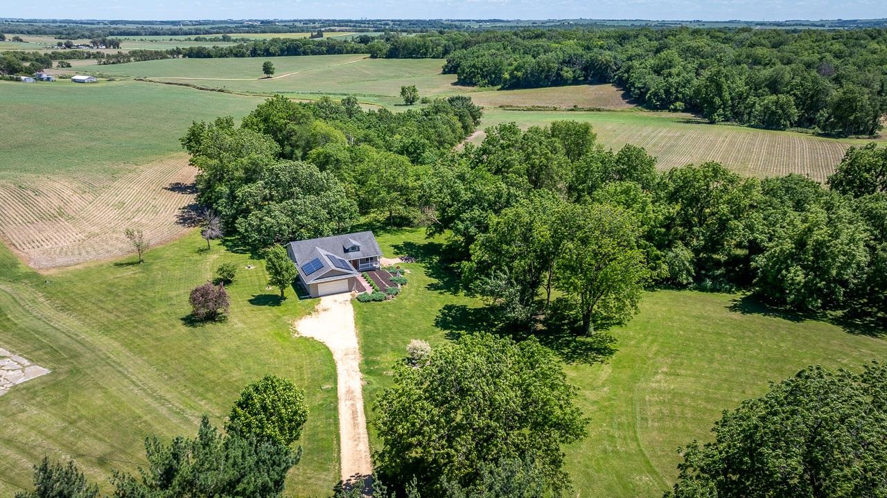 1011 North Dakota Road Ridott, IL 61067 - Photo 32 of 34 an aerial view of a residential houses with outdoor space and swimming pool