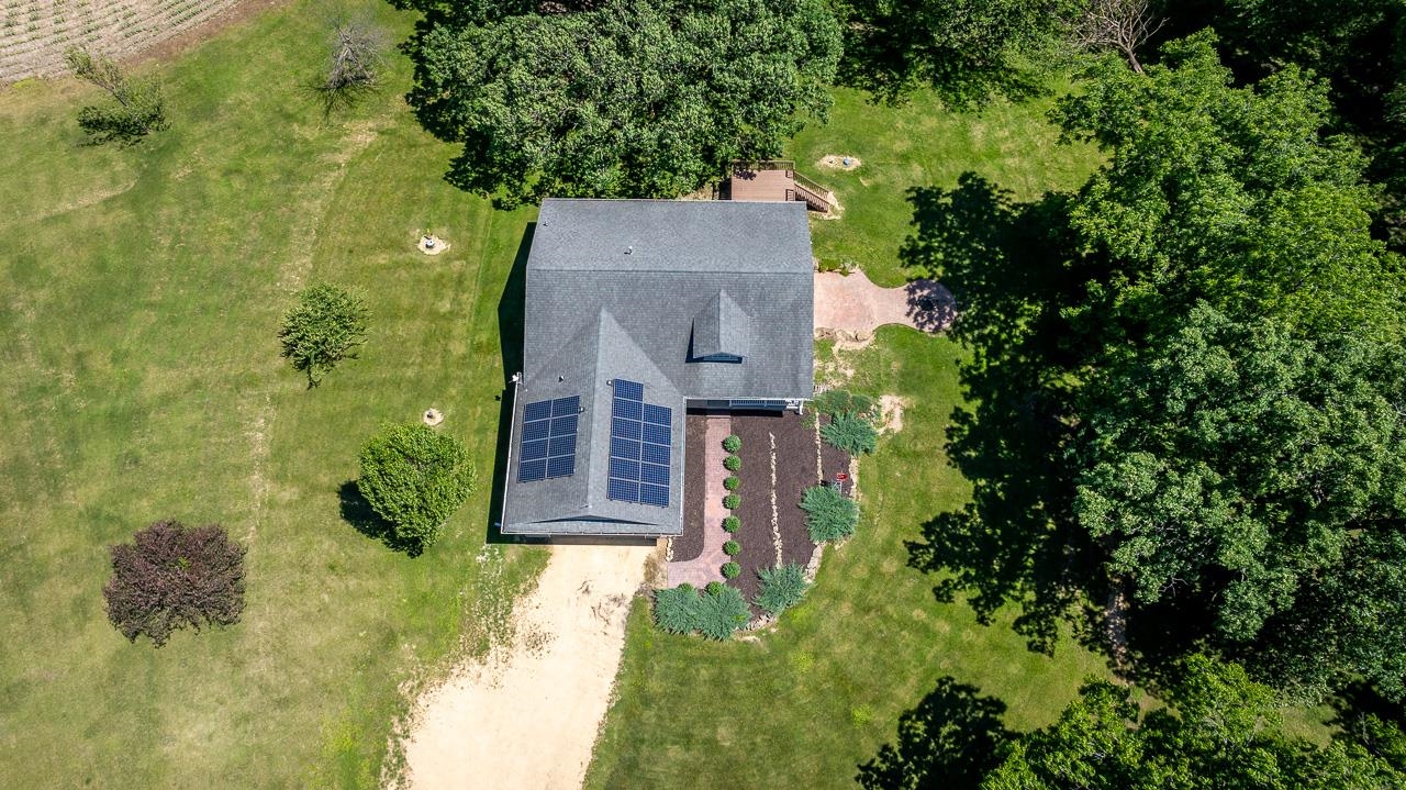 1011 North Dakota Road Ridott, IL 61067 - Photo 33 of 34 an aerial view of a house with a yard