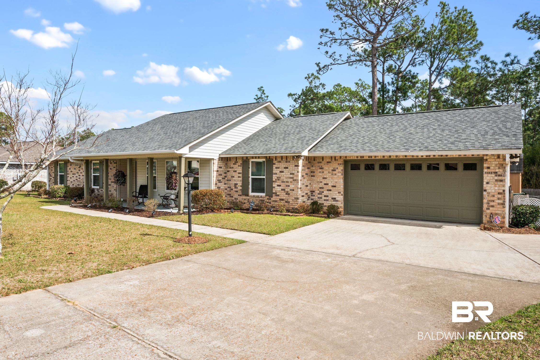 2553 Santa Rosa Drive Lillian, AL 36549 - Photo 43 of 51 Ranch-style house with a front yard and brick siding