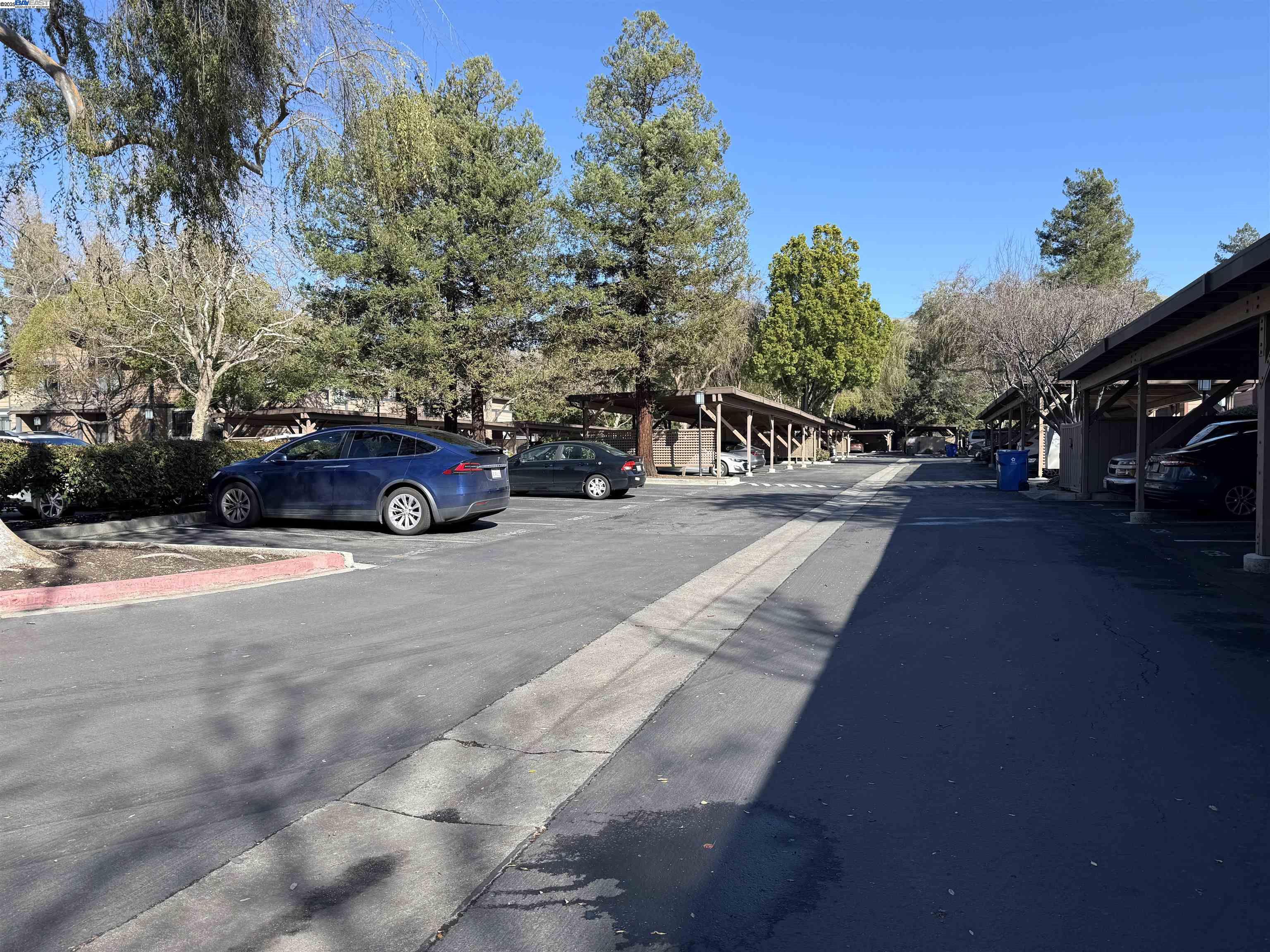 175 East Warren Common Fremont, CA 94539 - Photo 13 of 16 a car parked on the side of the road